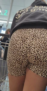 Thick brunette in short leggings and company