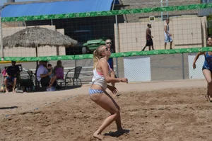 Beach volleyball blonde looking sexy and showing her body off