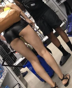 Hoodrat in leather booty shorts