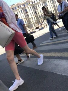 Awesome booty in spandex shorts, candid girl on a sidewalk