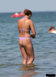 A bunch of sexy beach voyeur babes in bikinis, thongs and topless