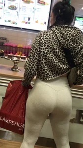 Brunette babe with a great ass in tight grey leggings