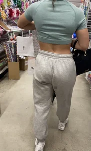 Fit Latina in grey sweats