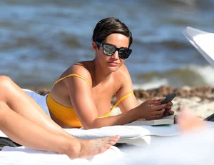 Frankie Bridge nip slips in a bikini on the beach