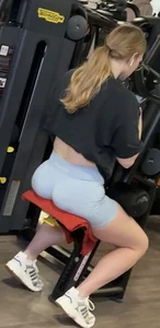 Hot blonde in gym just to show off her tight ass in blue shorts