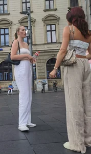 Long blonde braless in a white outfit (many pictures)