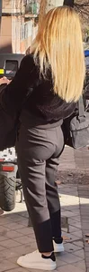 Tiny blonde in black pants