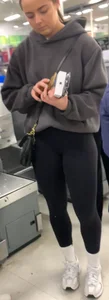 Perfect round ass showing off her long socks and black leggings