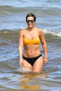 Frankie Bridge nip slips in a bikini on the beach