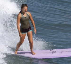 Candid surfer babes on the beach and in bikinis