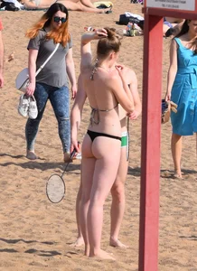 Girl in Swimsuit on the Beach Candid Photo