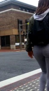 College girl in striped leggings walking with nice ass