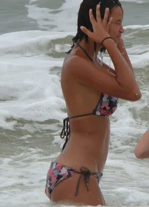 Sexy light skin black girl in a bikini with incredible body
