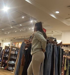 Light skin in grey leggings