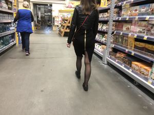 Nice legs in black pantyhose and hot ass in zipper skirt, hot chick on high heels at the supermarket creepshots