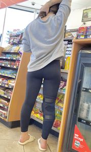 Leg brace girl shows round butt