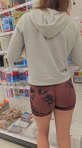 Latina in tight brown shorts