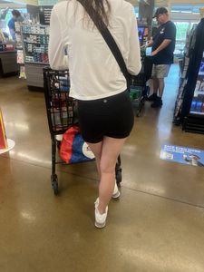 Hand print on tight ass Brunette (Biker shorts)