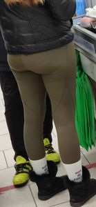 Blonde milf with a big hot butt in green leggings at the supermarket creepshots