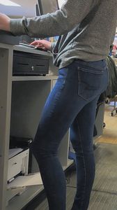 Store worker in jeans