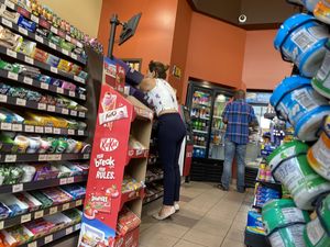 Short girl with Small Waist and Tight Pants bending over counter (OC)