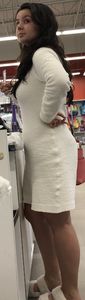 Busty brunette beauty in a fuzzy dress
