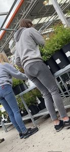 Teens fiddling with flowers