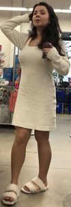 Busty brunette beauty in a fuzzy dress