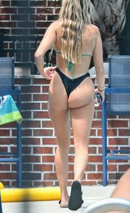 Fantastic ass at the pool in a thong