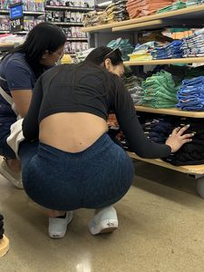 Slim latina in blue leggings squatting and shopping (oc)