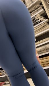 Milf bending over in leggings