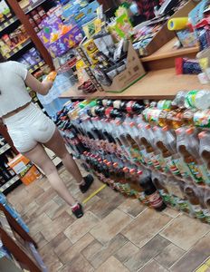 Perfect hot ass at the grocery store - candid girl wearing shorts and a top bend over closeup