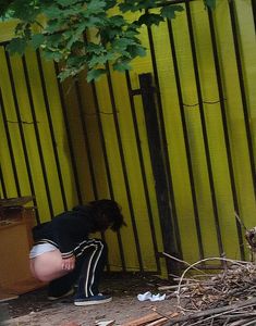 Girl taking a leak outdoors