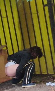 Girl taking a leak outdoors